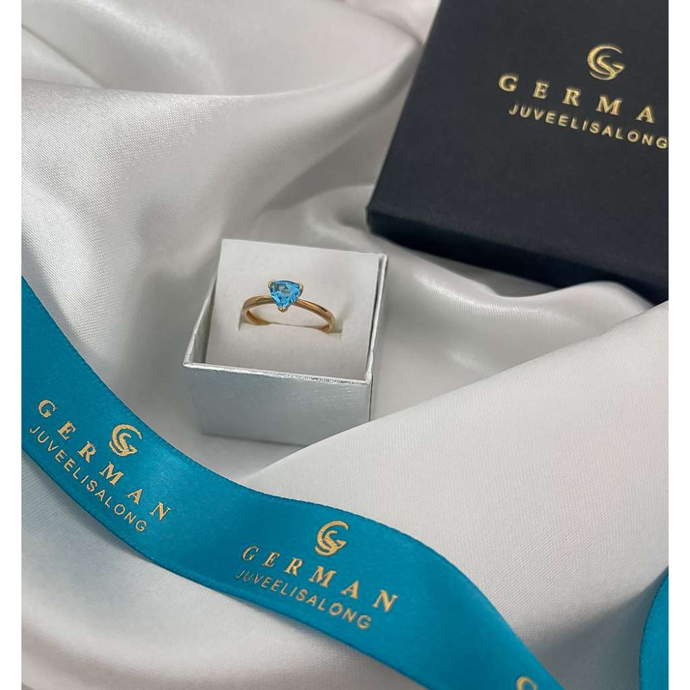 Rose Gold Ring with Triangle-Cut Blue Topaz